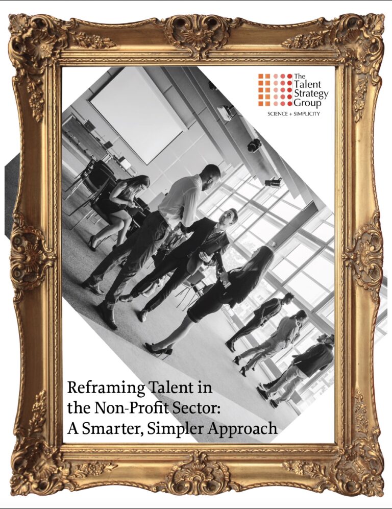 A gold ornate frame surrounds a black-and-white photo of professionals conversing in an office. Text reads: “Reframing Talent in the Non-Profit Sector: A Smarter, Simpler Approach,” with The Talent Strategy Group logo above, highlighting smarter talent strategies.